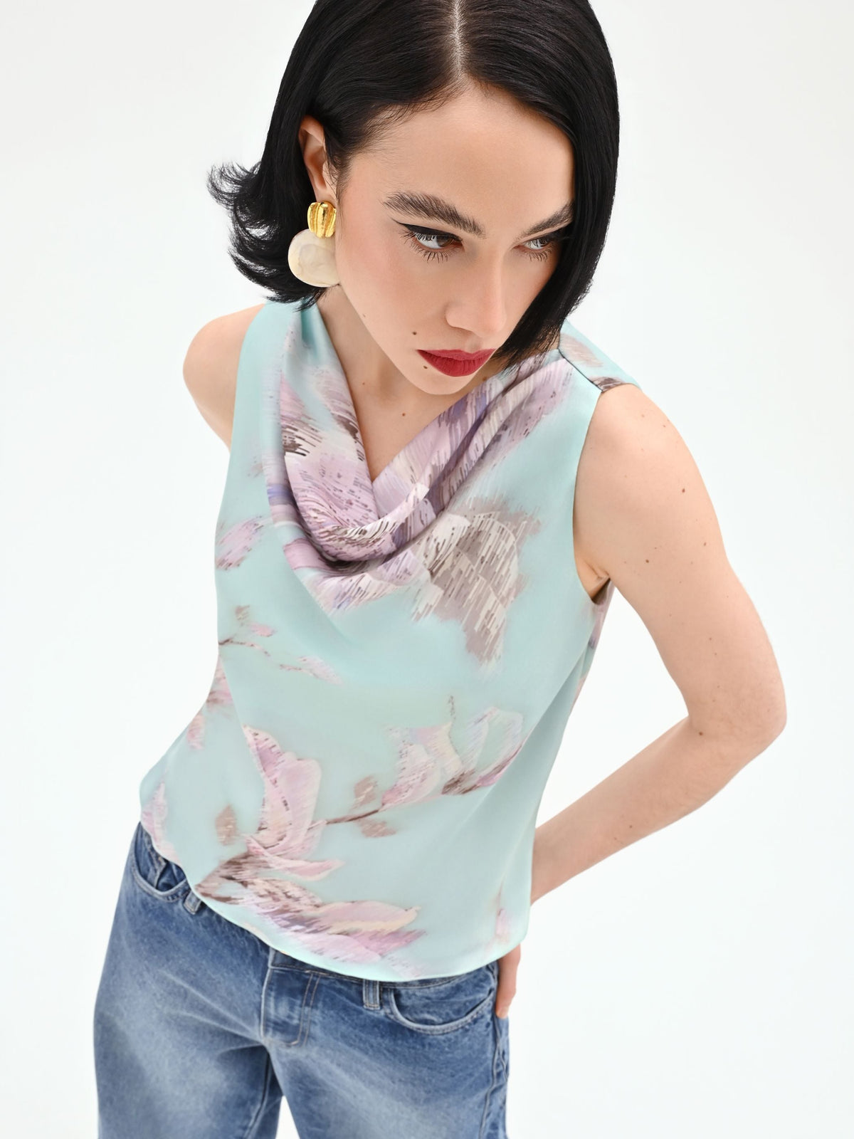 Top verde menta con stampa floreale jacquard
