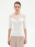 Maglia color panna con gioco di trasparenze