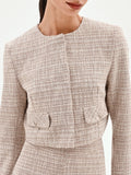 Giacca beige chiaro in tweed con tasche applicate