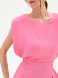Tuta rosa con pantalone a palazzo