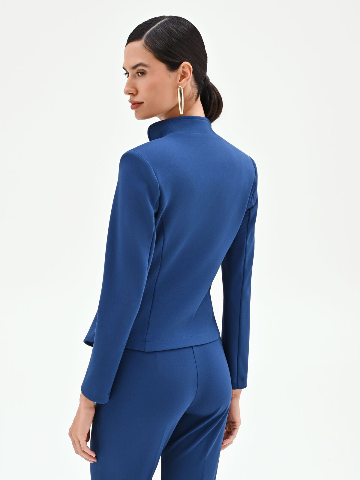 Giacca blu brillante con zip asimmetrica